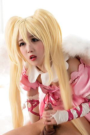 Hot japanese girl Ria Kurumi in pink doll costume sits on her boyfriend's face