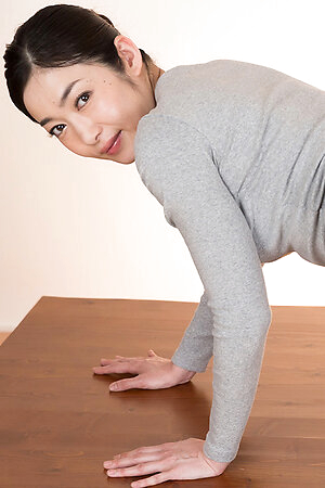 Dress-wearing classy seductress Ryu Enami using her feet to get this dude to cum