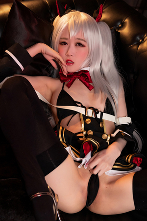 Japanese cosplayer Ria Kurumi in black stockings shows off her ass and shaved pussy