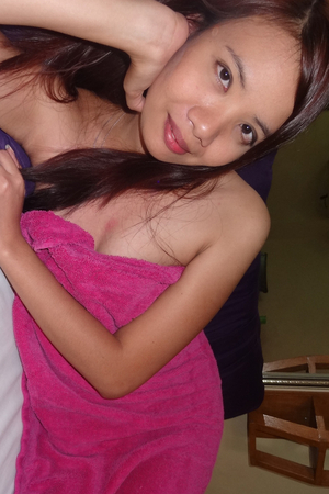 Young MILF pics shows Filipina girl fucking like she wants another